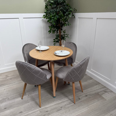 Life Interiors Lucia Dining Set With Round Table And Set Of 4 Lucia Velvet Dining Chairs - image 1