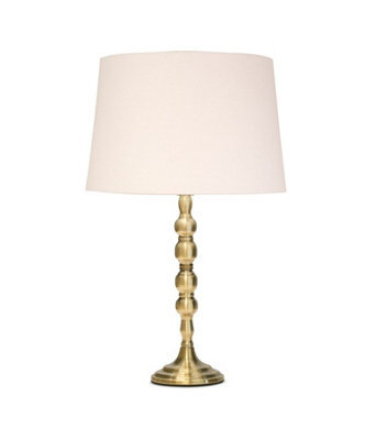 Lighting Supermarket Bergen Slimline Antique Brass Candlestick Table Lamp With Ivory Linen Shade - image 1