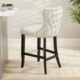 The Furniture Market Boudoir Natural Oatmeal Fabric Button Back Kitchen Counter Bar Stool Wing Back Design Stud Detailing Black Legs Chrome Foot Bar - thumbnail 1