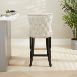 The Furniture Market Boudoir Natural Oatmeal Fabric Button Back Kitchen Counter Bar Stool Wing Back Design Stud Detailing Black Legs Chrome Foot Bar - thumbnail 4