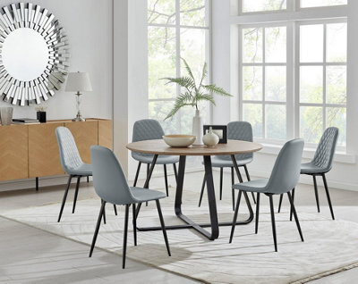 Furniturebox Uk Santorini Brown Round Round Dining Table And 6 Grey Corona Black Leg Chairs - image 1