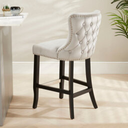 The Furniture Market Boudoir Light Grey Velvet Button Back Kitchen Counter Bar Stool Wing Back Design Stud Detailing Black Legs Chrome Foot Bar - thumbnail 1