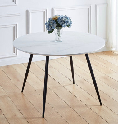 Hallowood Furniture Cullompton Large Round Dining Table (1.2M) With White Marble Effect Top And Black Metal Legs - image 1