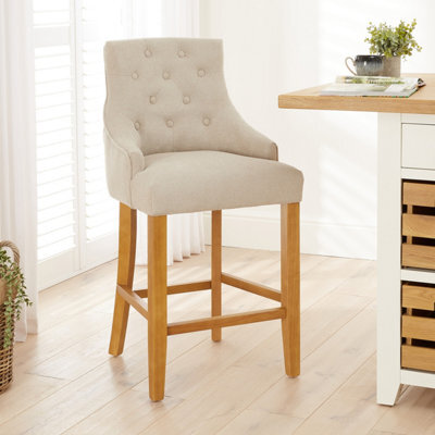 The Furniture Market Luxury Natural Oatmeal Fabric Scoop Back Kitchen Counter Bar Stool Quilted Button Back Stud Detailing Solid Wood Frame - image 1