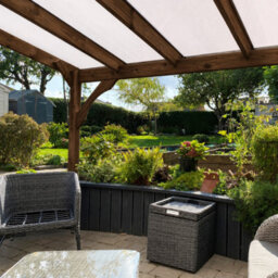 Rutland County Garden Furniture Wall Mounted Polycarbonate Roof Gazebo - Rustic Brown - 3M Depth X 4.34M Width - 3 Posts / Brown Glazing Bars / Opal Sheets - thumbnail 2