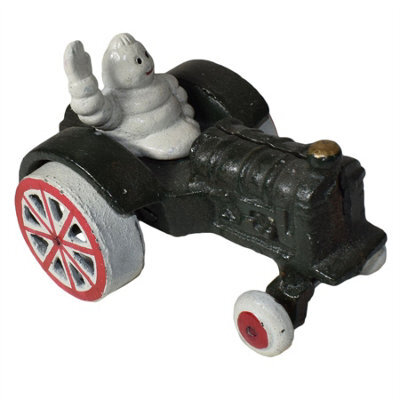 AB Tools Michelin Man Waving In Tractor Mascot Figure Statue Bibendum Figurine Cast Iron - image 1