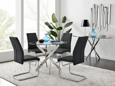 Furniturebox Novara Clear Tempered Glass 100Cm Round Dining Table With Chrome Starburst Legs & 4 Black Lorenzo Faux Leather Chairs - image 1