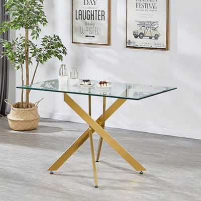Furniture in Fashion Daytona Small Clear Glass Dining Table With Brushed Gold Legs - image 1