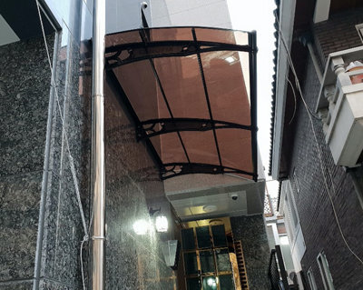 Canofix UK Canofix Door Canopy Pc 2000 Width X 1270 Projection (Black Bracket - Bronze Sheet) - image 1