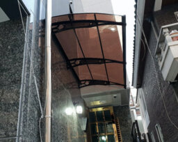 Canofix UK Canofix Door Canopy Pc 2000 Width X 1270 Projection (Black Bracket - Bronze Sheet)