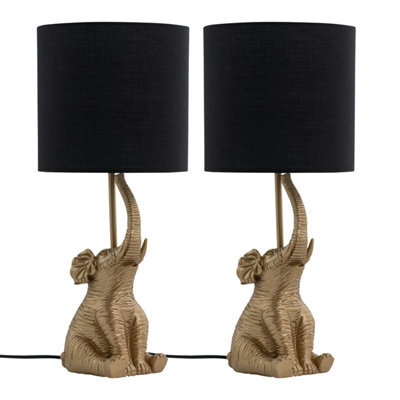 First Choice Lighting Set Of 2 Elephant Gold Resin Table Lamps With Black Fabric Shades - image 1