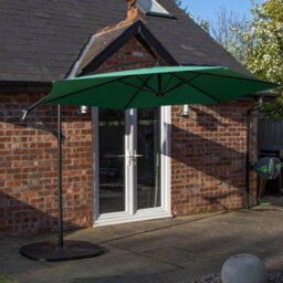 Samuel Alexander Outdoor 4 Person Round Glass Top Garden Dining Table Chairs With Green Banana Parasol And Base - thumbnail 4
