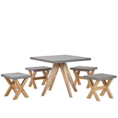 Beliani Garden Dining Set With Stools 4 Seater Olbia Concrete Grey - image 1