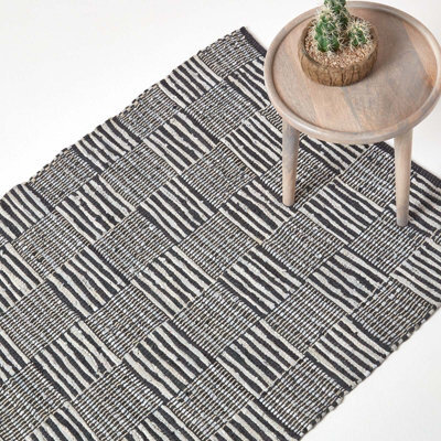 Homescapes Black & White Real Leather Handwoven Striped Block Check Rug, 120 X 180 Cm - image 1