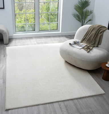 Comfy Washable Low Pile Living Room Area Rug - Anti-Slip Felt Backing Cream 60Cm X 100Cm - image 1