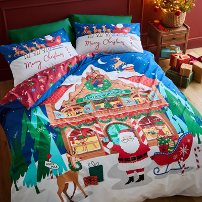 Catherine Lansfield Christmas Santa's Workshop Reversible King Duvet Cover Set With Pillowcases Navy Blue - image 1