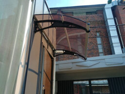 Canofix UK Canofix Door Canopy Pc 1800 Width X 1000 Projection (Black Bracket - Bronze Sheet)