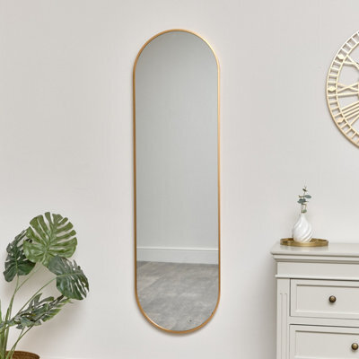 Melody Maison Warm Gold Oval Framed Wall Mirror 140Cm X 40Cm - image 1