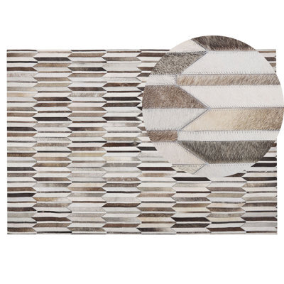 Beliani Rug Kulalar Beige 140 X 200 Cm Leather - image 1