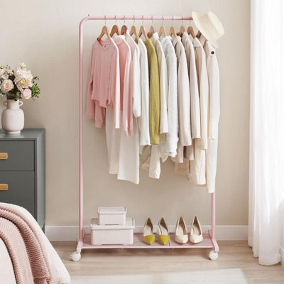 Songmics Clothes Rack, Metal Clothing Rail With Storage Shelf, Laundry Hanging Rail, Lockable Wheels, High Capacity, Jelly Pink - image 1