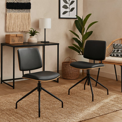 Wyld Haus Nairobi Swivel Dining Chairs Set Of 2 Black Veneer And Faux Leather - image 1
