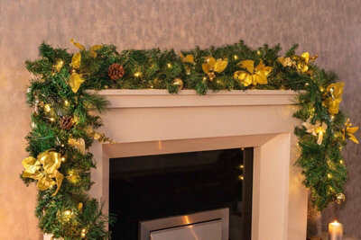 9Ft Pre-Lit Artificial Christmas Garland With Gold Decor - image 1