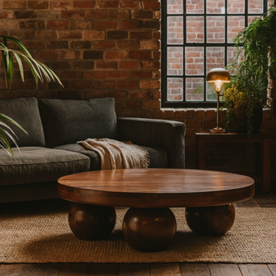 Wyld Haus Reims Chestnut Round Mango Wood Coffee Table With Ball Feet - image 1