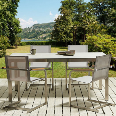 Beliani Beige 4-Pack Cantilever Garden Chairs With Stainless Steel Frame And Plywood Armrests - image 1