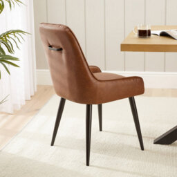 The Furniture Market Cooper Vintage Tan Brown Faux Leather Dining Chair Flute Back Design Black Satin Metal Legs Cushioned Seat Adjustable Feet - thumbnail 2