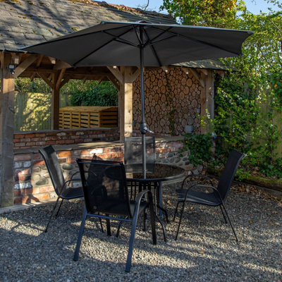 Samuel Alexander Outdoor 4 Person Round Glass Top Garden Dining Table & Chairs Set With Grey Havana Parasol - image 1