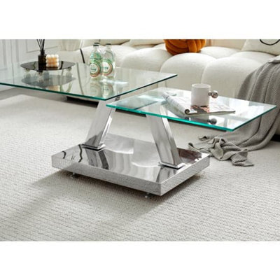 Furniture in Fashion Magic Wings Swivel Clear Glass Coffee Table With Steel Base - image 1
