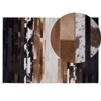 Beliani Rug Dalyan Brown 140 X 200 Cm Leather - image 1