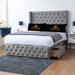 UKBEDFURNITURE Jasmine Grey Plush Wingback Divan Bed With 2 Foot End Drawers & 54 Inch Headboard - thumbnail 1