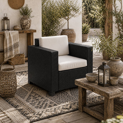 Wyld Haus Raco Black Rattan Single Outdoor Armchair With Thick Cushioned Seat And Armrests - image 1