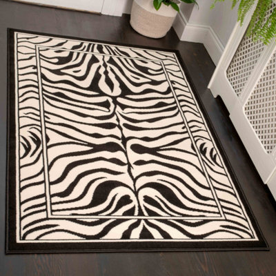 Loomed Black White Zebra Print Living Room Rug 80X150Cm - image 1