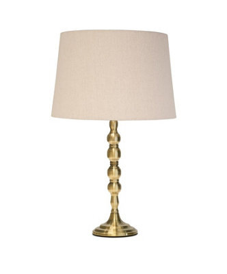 Lighting Supermarket Bergen Slimline Antique Brass Candlestick Table Lamp With Natural Linen Shade - image 1