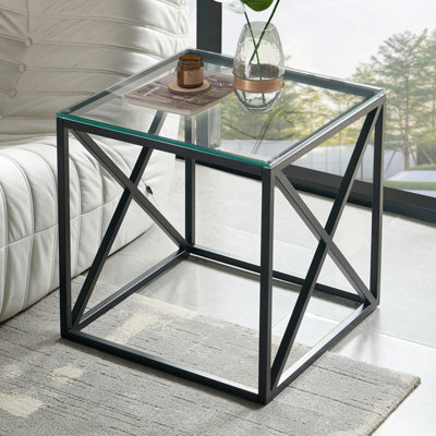 The Furniture Market Monza Glass Side Table 55Cm Square Clear Glass Top, Black Cross Frame Design, Adjustable Foot Pads Modern Living Room Lamp Table - image 1
