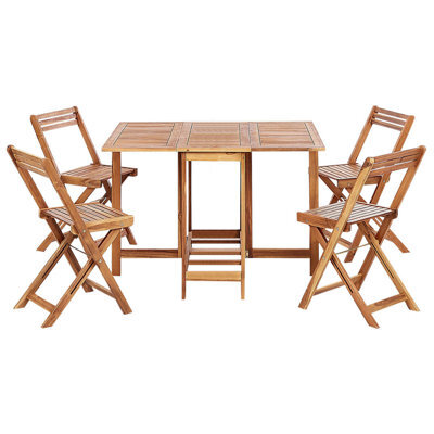 Beliani Garden Dining Set 4 Seater Frassine Acacia Wood Brown - image 1