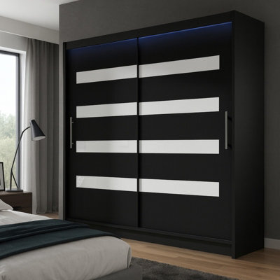 Bega Xi 180 Wardrobe With Sliding Doors Hanging Rail Shelves Black With White And Led Lights - image 1