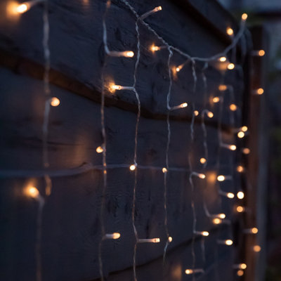 Gardenwize Garden Outdoor 192 Led Solar Powered Warm White Led Curtain Fence Lights - image 1