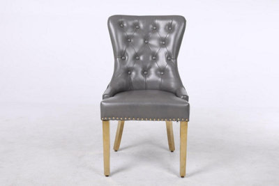 Modernique A Pair Of Leather Aire Dining Chairs With Golden Legs, Knocker & Studs In Grey - image 1