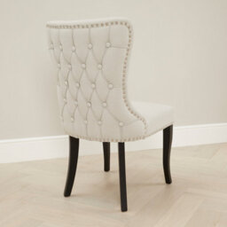 The Furniture Market Boudoir Natural Oatmeal Fabric Wing Back Dining Chair Deep Button Back Chrome Stud Detailing Black Satin Legs Sprung Base - thumbnail 8