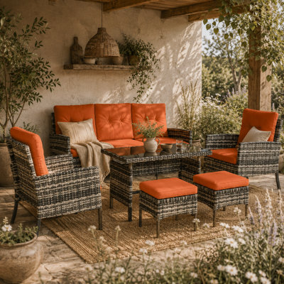 Wyld Haus Lodori 7-Seater Grey Rattan Outdoor Dining Set With Orange Cushions And Glass Table - image 1