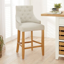 The Furniture Market Luxury Natural Fabric Scoop Back Kitchen Counter Bar Stool Oak Legs Quilted Button Back Stud Detailing Solid Wood Frame