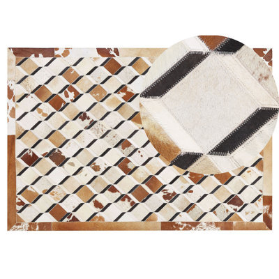 Beliani Rug Serinova Brown 140 X 200 Cm Leather - image 1