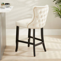 The Furniture Market Boudoir Champagne Velvet Button Back Kitchen Counter Bar Stool Wing Back Design Stud Detailing Black Legs Chrome Foot Bar - thumbnail 1