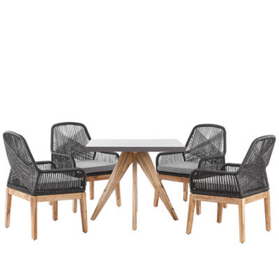 Beliani Garden Dining Set 4 Seater Olbia With Cushions Concrete Black - image 1