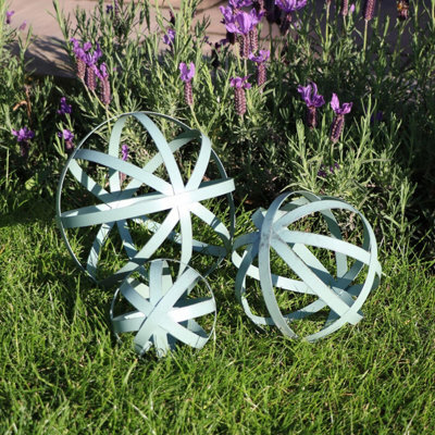 Melody Maison Set Of 3 Antique Sage Green Decorative Garden Spheres - image 1