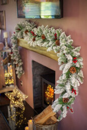9Ft Artificial Snow Dusted Garland With Pinecones And Berries - thumbnail 1