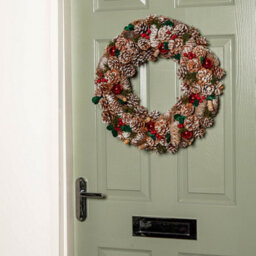 Samuel Alexander 50Cm Hanging Christmas Yulefest Wreath With Red Baubles & Snow Tipped Pine Cones - thumbnail 1